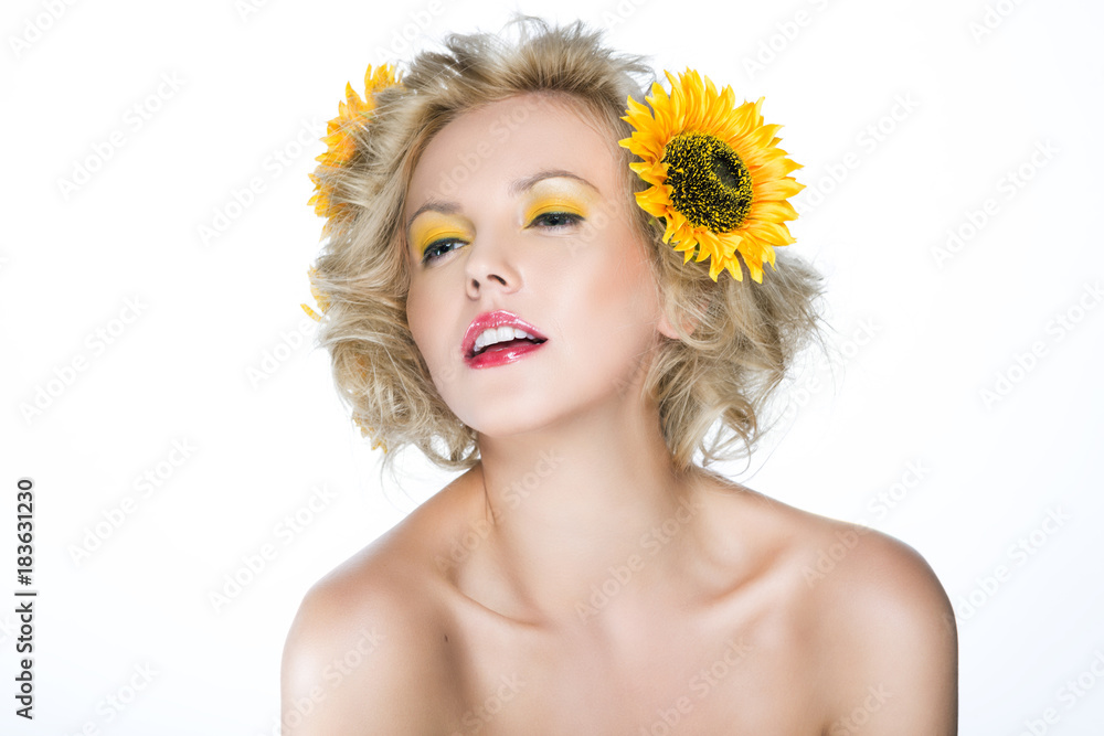 Beautiful woman with sunflower flowers in her hair Stock Photo | Adobe ...