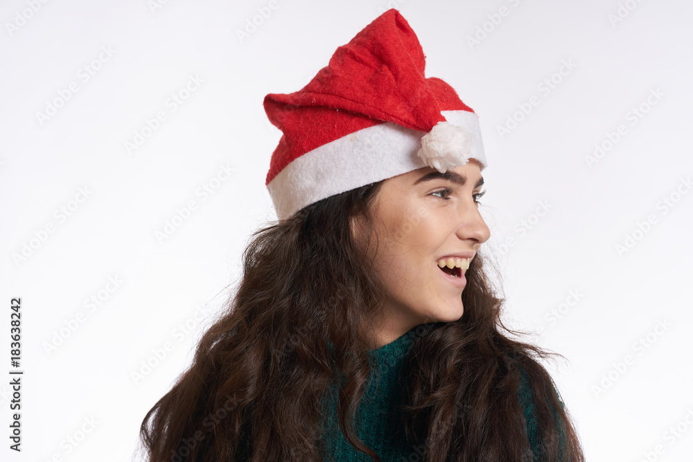 smiling woman in a Christmas hat, portrait, christmas smiling woman in a Christmas hat, portrait, christmas