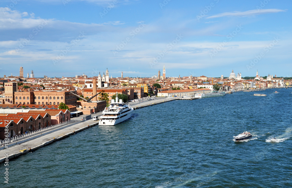panoramic view of Venice from the height of the cruise ship to Piazza San Marco and the Ducale, or Doge's Palace. on the Grand canal many boats, river transport, in the background of ancient architect