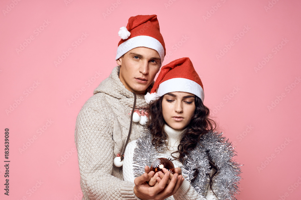 couple on a light pink background, new year couple on a light pink background, new year