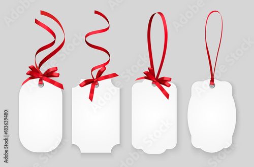 Vector white empty paper name tags, greeting cards or coupons with red shiny ribbons isolated on grey background
