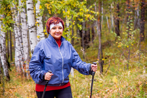 Senior lady nordic walking