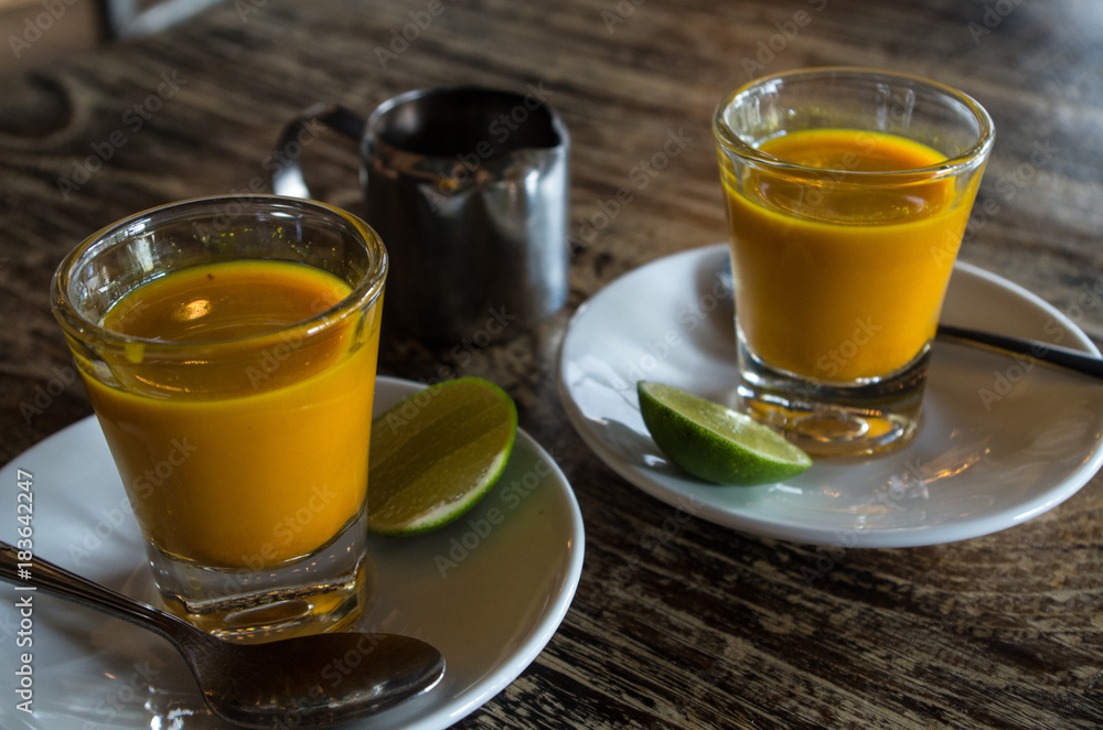 Two healthy jamu shots in close-up. Two healthy jamu shots in close-up.