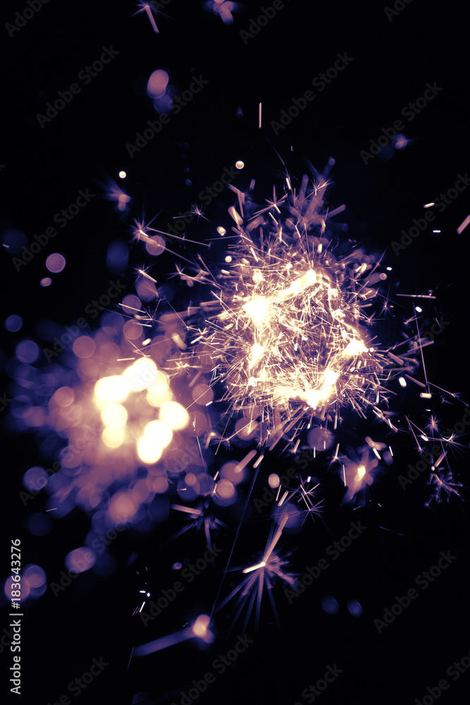 Obraz premium Firework of sparkling star shape on dark background. Celebration concept.