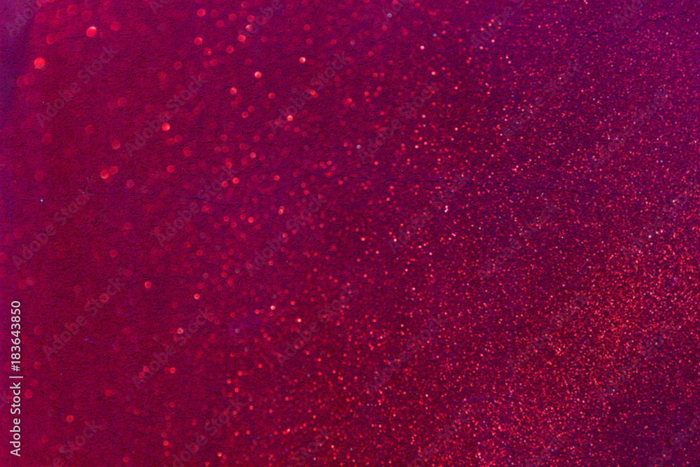 Abstract Red background with small sequins closeup