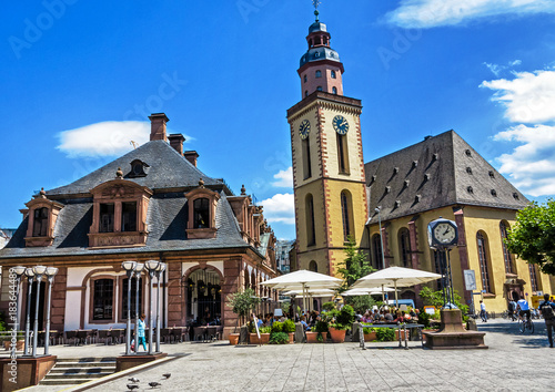 The historic Café Hauptwache (popular meeting place) and St. Katharine church in the middle of the city of Frankfurt, Germany