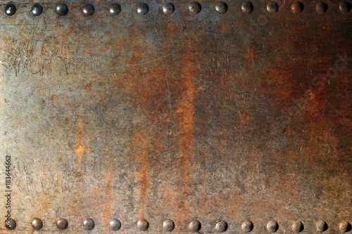 Old rusty texture with rivets photo