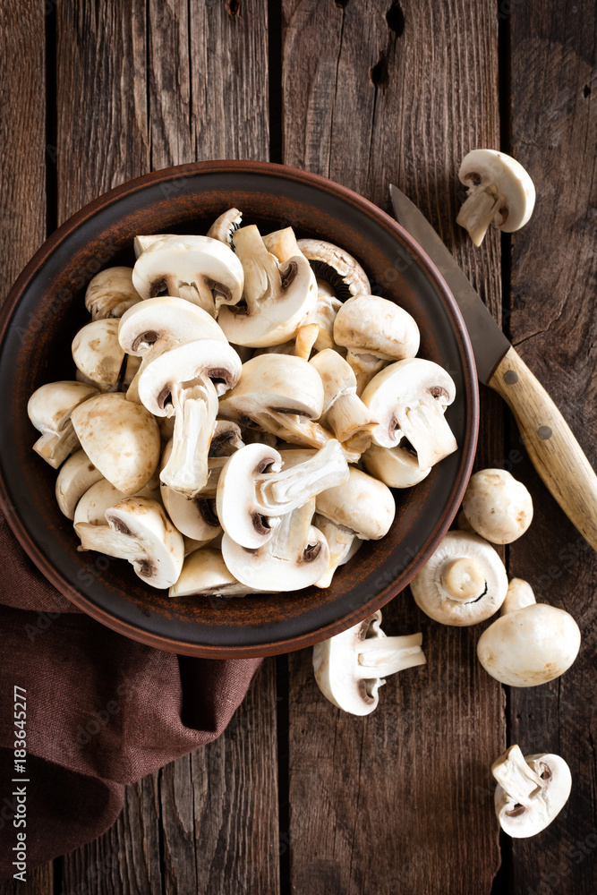 Fresh mushrooms on wooden table, top view Fresh mushrooms on wooden table, top view