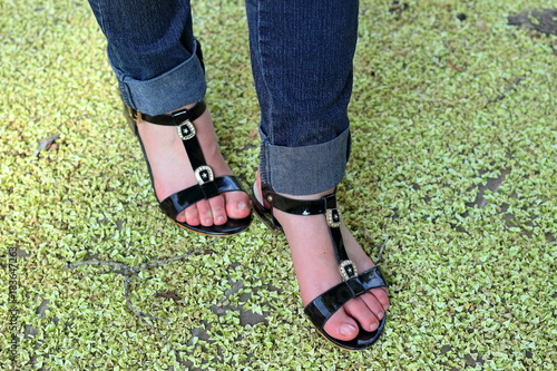 Feet girl in sandals