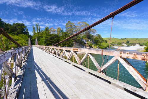 Historic suspension bridge near Clifden, New Zealand. Built in 1899, it spans the Waiau River and is 111.5 m long.