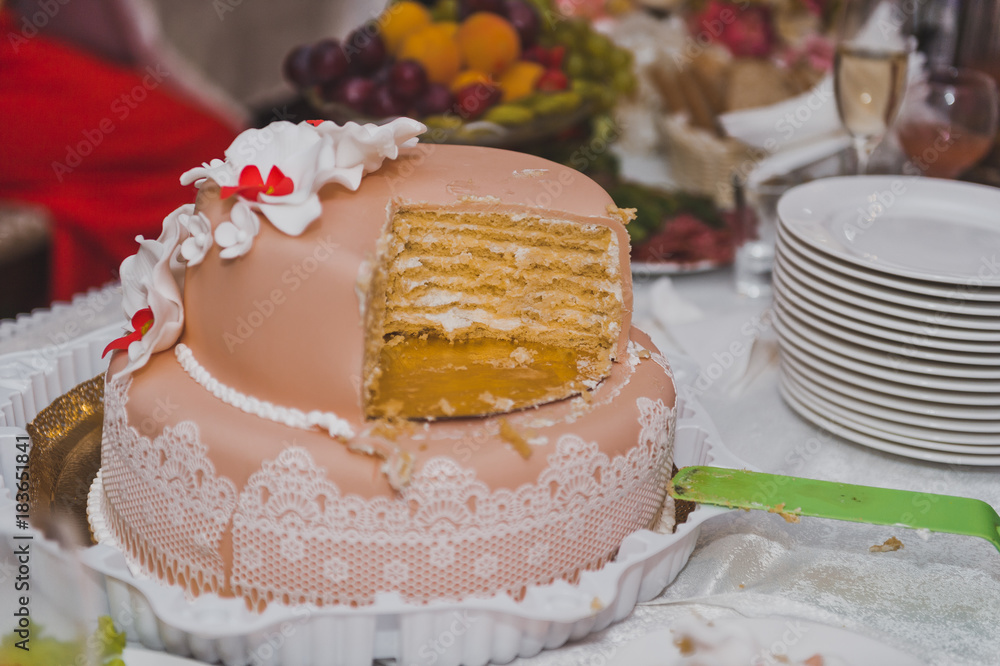 The couple shared a wedding cake for serving guests 9282. The couple shared a wedding cake for serving guests 9282.