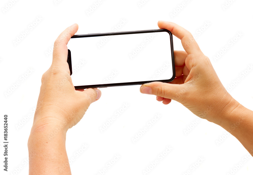 Two hands holding new smatphone mobile phone isolated on white background Two hands holding new smatphone mobile phone isolated on white background