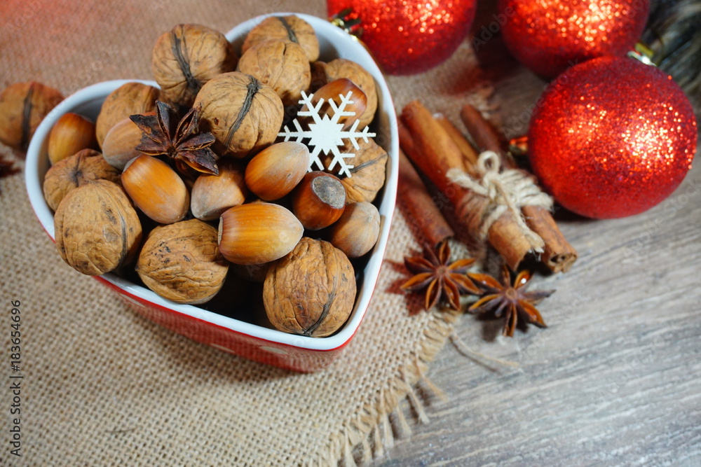 Nuts and spices.Christmas time. At the holiday table.Still life, food and drink, seasonal and holidays concept
Nuts and spices.Christmas time. At the holiday table.Still life, food and drink, seasonal and holidays concept