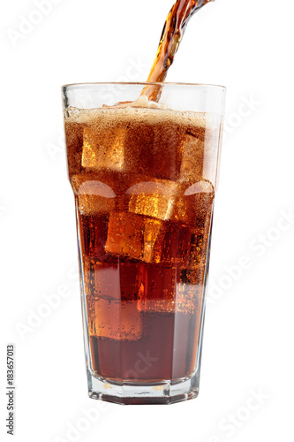 fizzy drink with ice in glass on white background photo