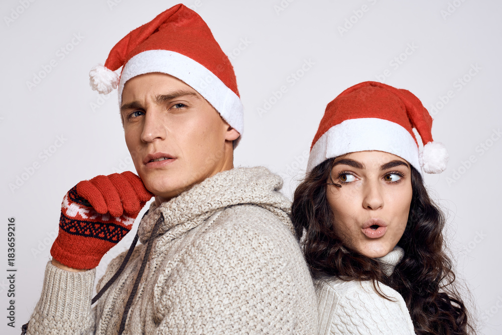 a couple is standing with their backs to each other, Christmas, winter a couple is standing with their backs to each other, Christmas, winter