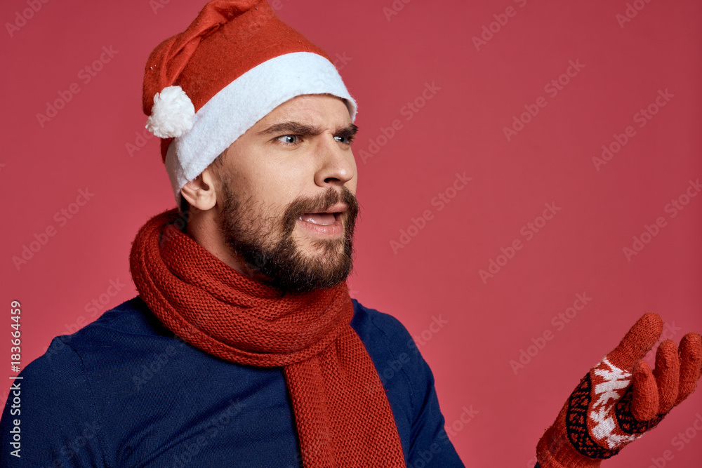 man in gloves, in a New Year's cap and scarf, portrait, new year man in gloves, in a New Year's cap and scarf, portrait, new year