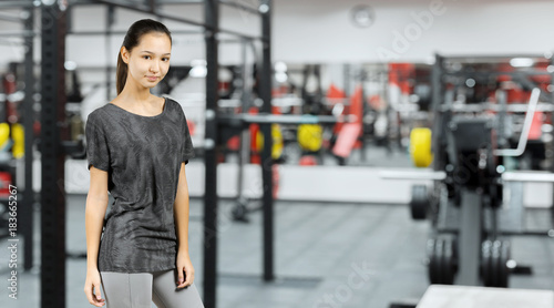 Young woman training in a fitness club