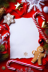 Christmas greeting card; christmas tree decoration on red background