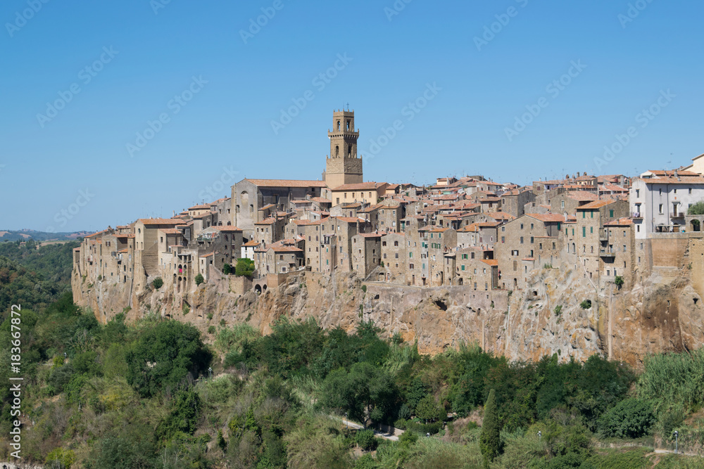 Pitigliano medieval village on tuff rocky hill, Italy