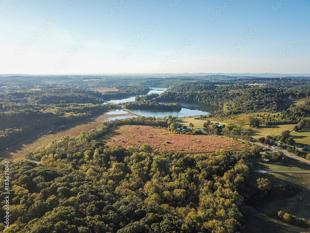 Aerial of Loganville, Pennsylvania around Lake Redman and Lake Williams during Fall