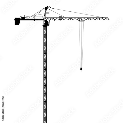 Silhouettes of crane on building