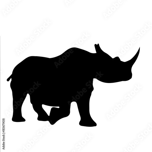 black and white vector silhouette of a rhino © tcheres