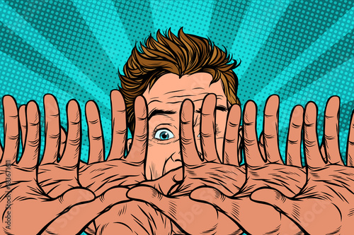 frightened man is protected by hands
