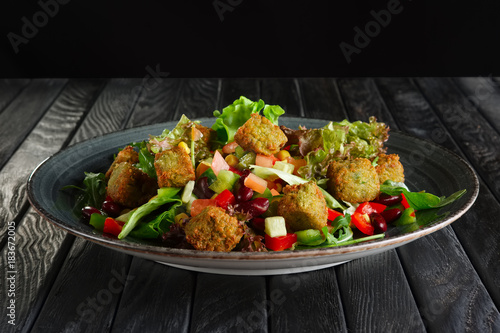 Salad with beans, falafel and vegetables