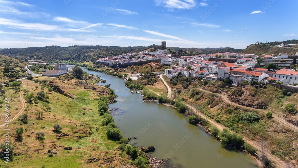 Obraz premium Aerial. The village of Mertola filmed with drone sky. Portugal Alentejo Guadiana