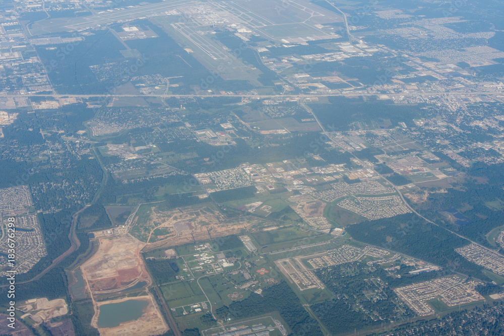 Obraz premium Metropolis Area of Houston, Texas Suburbs from Above in an Airplane
