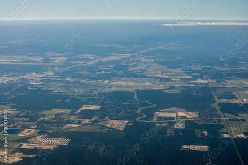 Metropolis Area of Houston, Texas Suburbs from Above in an Airplane