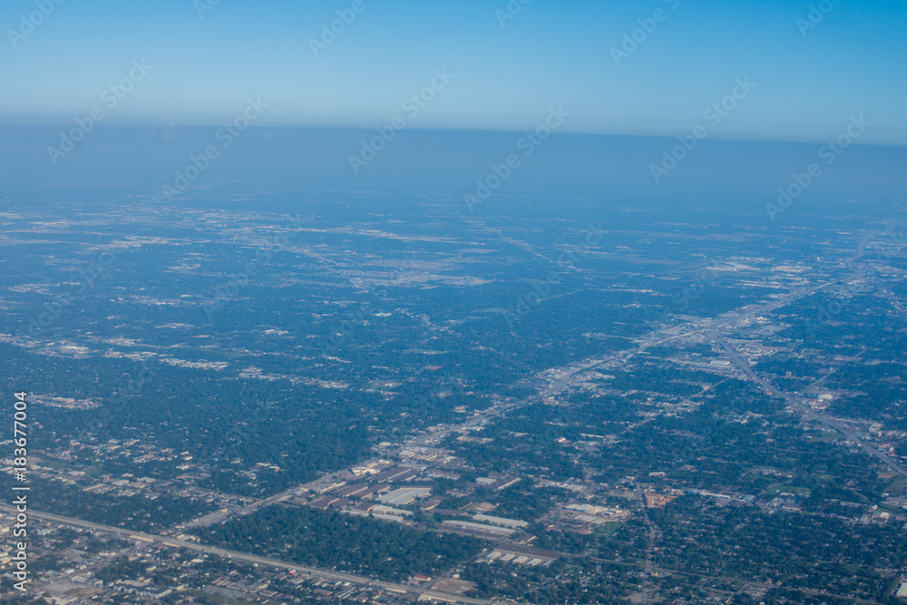 Metropolis Area of Houston, Texas Suburbs from Above in an Airplane Metropolis Area of Houston, Texas Suburbs from Above in an Airplane