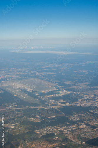 Metropolis Area of Houston, Texas Suburbs from Above in an Airplane