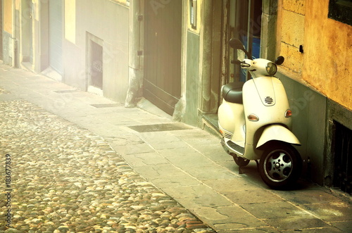 Rome, Italy - November 14, 2017: Group of Scooter Vespa parked on old street in Rome, Italy