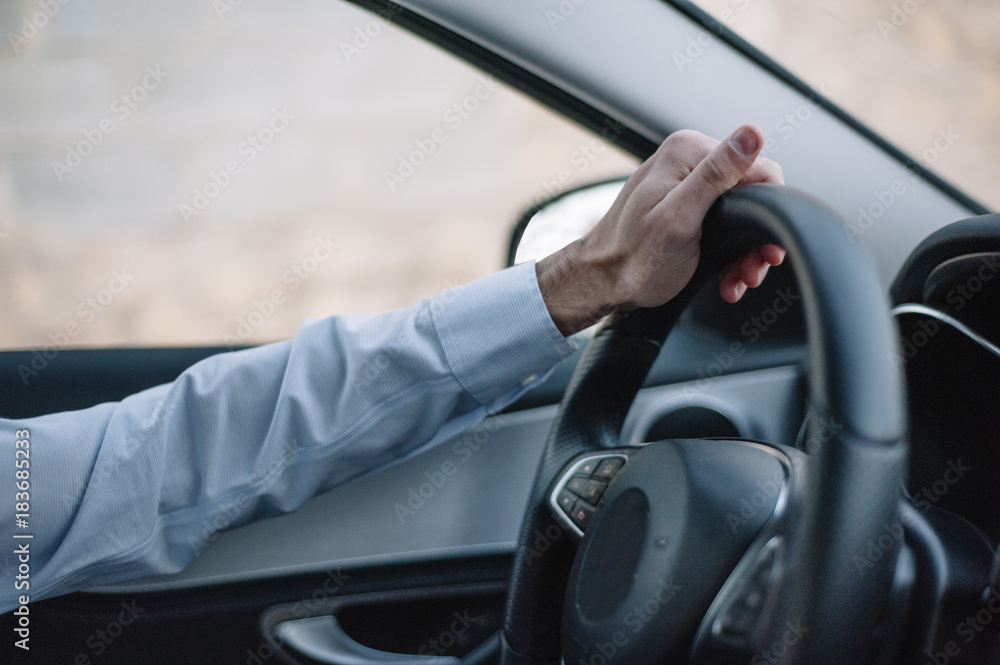 arm man steering wheel car