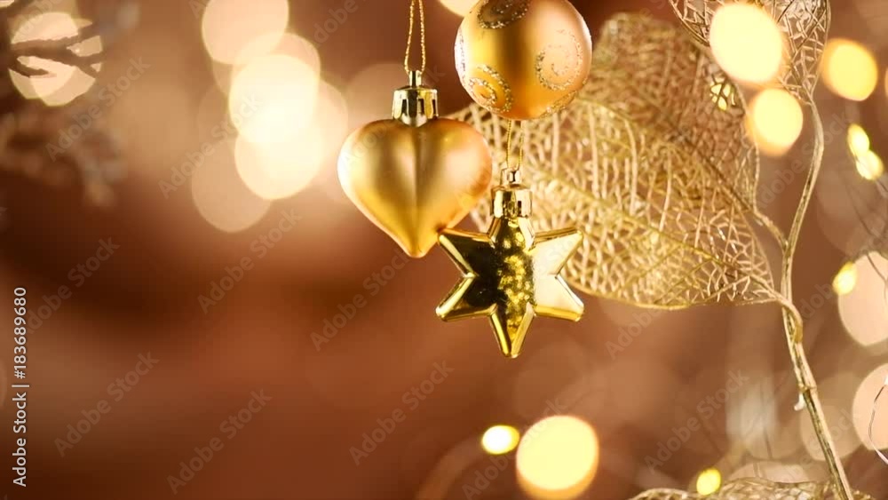 Christmas and New Year golden decoration. Abstract blinking holiday background. Slow motion 4K UHD video footage. 3840X2160 Christmas and New Year golden decoration. Abstract blinking holiday background. Slow motion 4K UHD video footage. 3840X2160