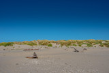 Blue Sky and Grassy Sand Dunes