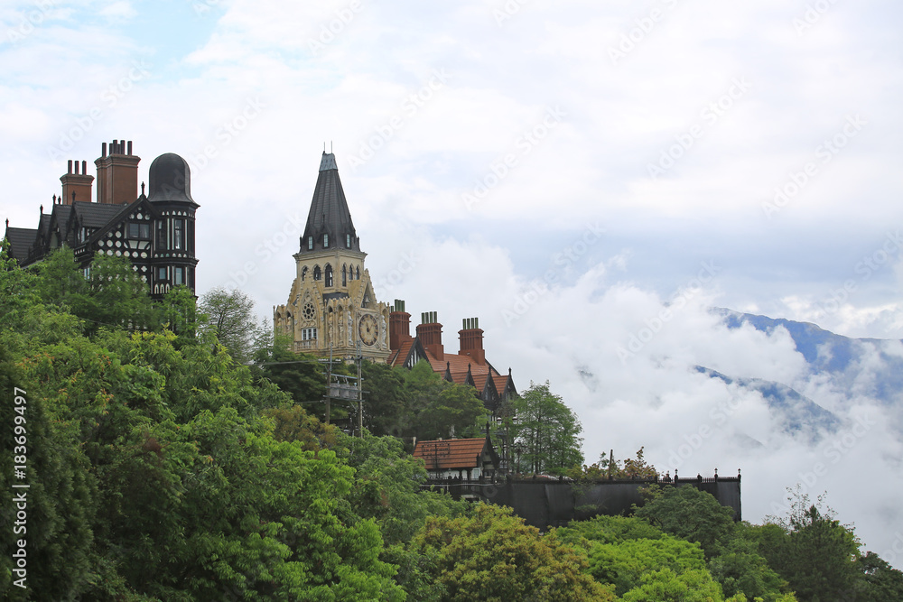 castle on the foggy peak with mountains in Cingjing Farm, Nantou, Taiwan castle on the foggy peak with mountains in Cingjing Farm, Nantou, Taiwan