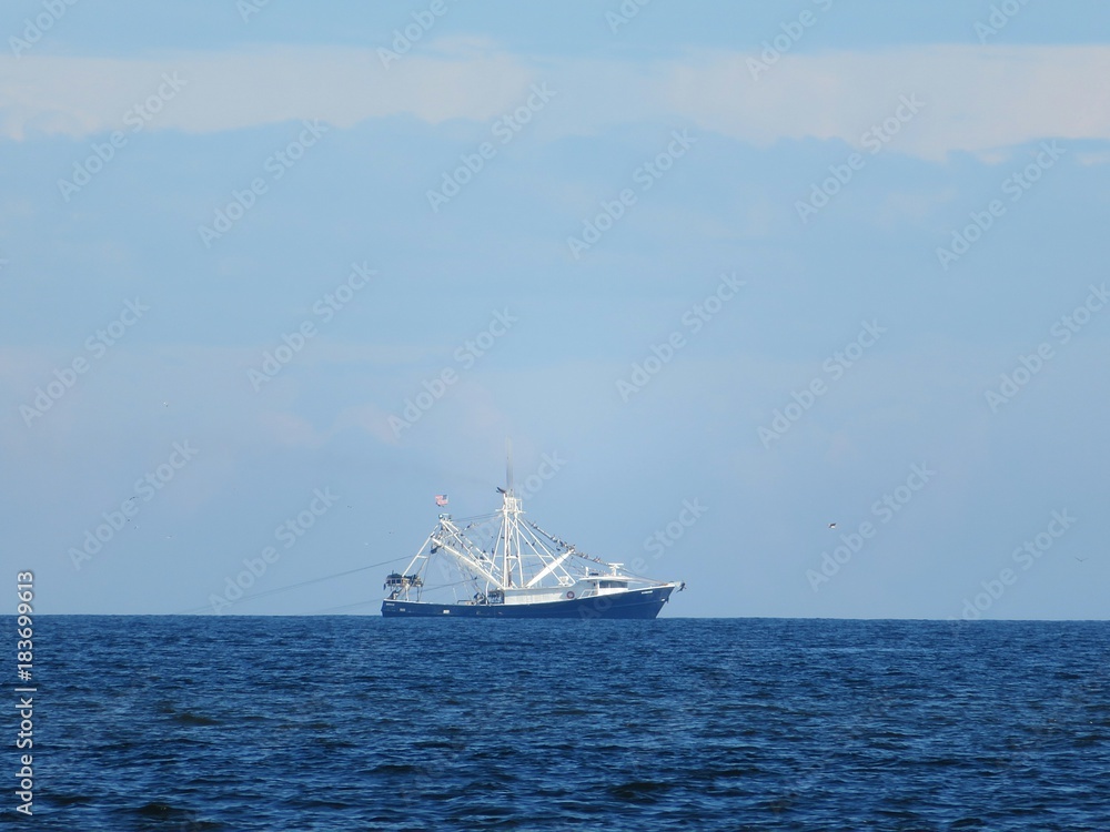 Ship on the background of the ocean