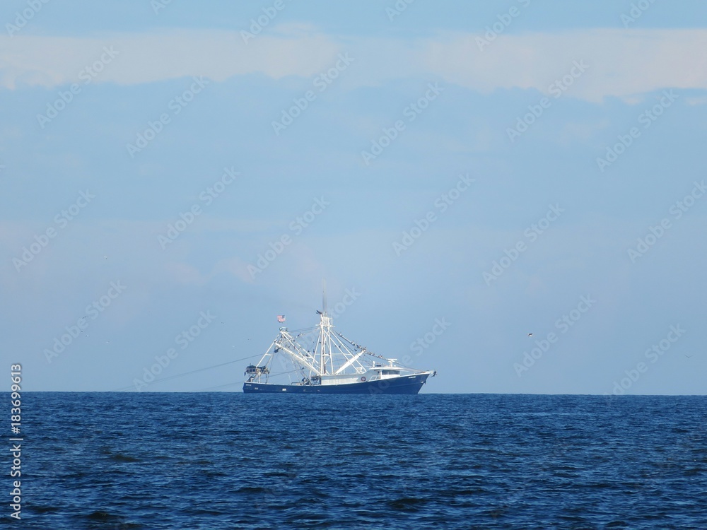 Ship on ocean background in Atlantic coast of North Florida Ship on ocean background in Atlantic coast of North Florida