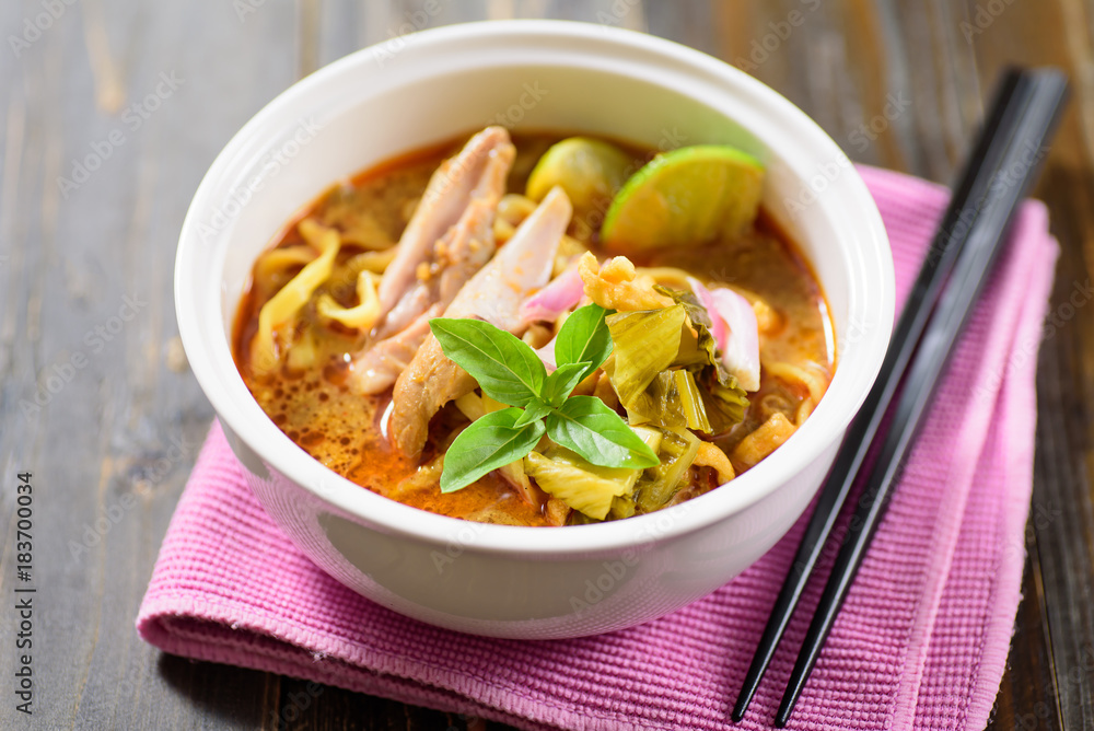 Northern Thai food (Khao soi), curry noodles soup with chicken Northern Thai food (Khao soi), curry noodles soup with chicken