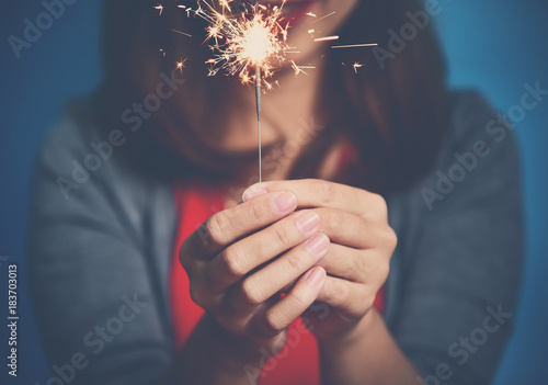 Asian Woman with sparkler.