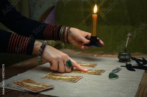 Tarot cards on fortune teller desk table. Future reading.