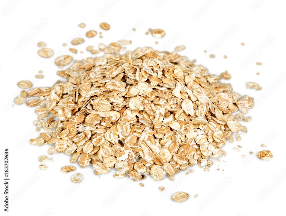 Oat flakes pile on white background Oat flakes pile on white background