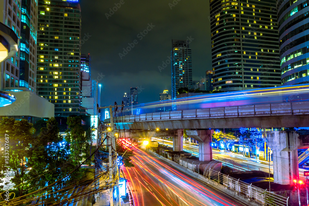 The beautiful landscape of Bangkok at night, full of light and busy traffic. long exposure