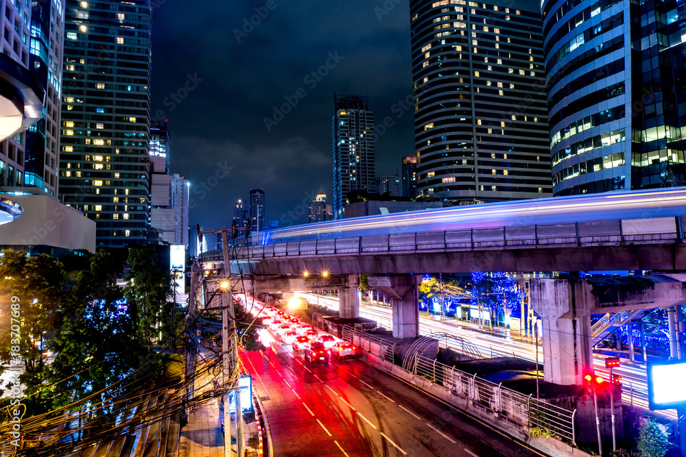 The beautiful landscape of Bangkok at night, full of light and busy traffic. long exposure The beautiful landscape of Bangkok at night, full of light and busy traffic. long exposure