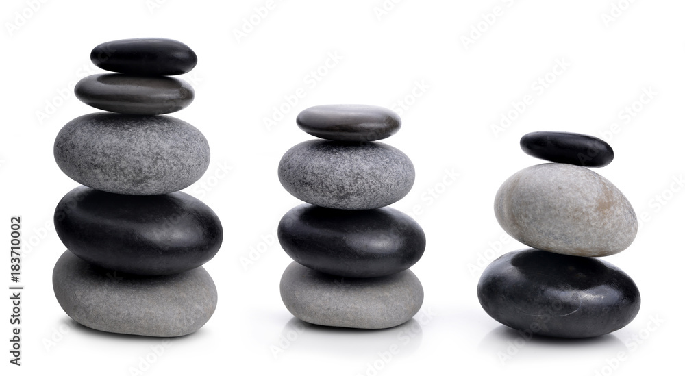 Balancing zen pebble stones isolated on a white background.Spa and healthcare concept.