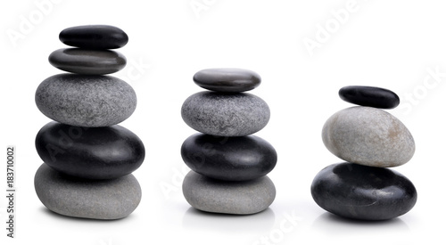 Balancing zen pebble stones isolated on a white background.Spa and healthcare concept.