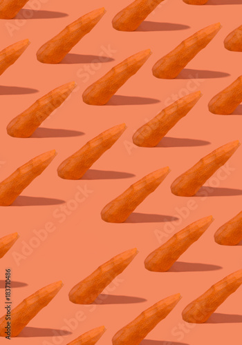 Abstract collage of refined carrots with shadow