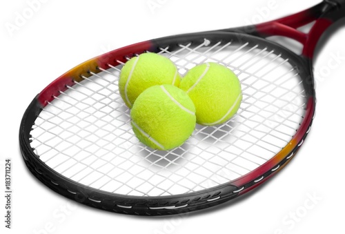 Tennis Racket and Balls © BillionPhotos.com